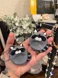 Raccoon worry stone